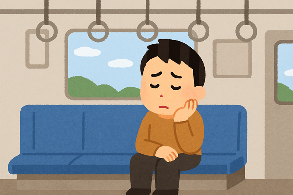 電車内で眠れず、目的地に着くまでを退屈に感じる男性