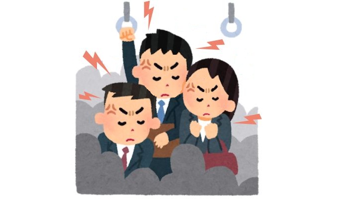 満員電車で座れずイライラする会社員たち